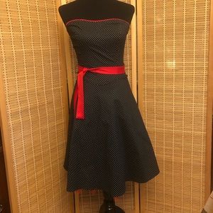 Strapless black and white polkadot dress with flirty red trim by Ruby Rox size 9